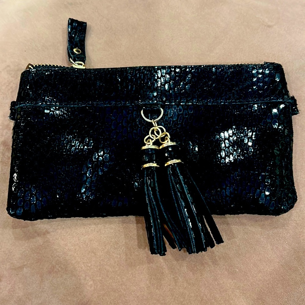 Stunning black leather tassel clutch! Perfect for a night on the town